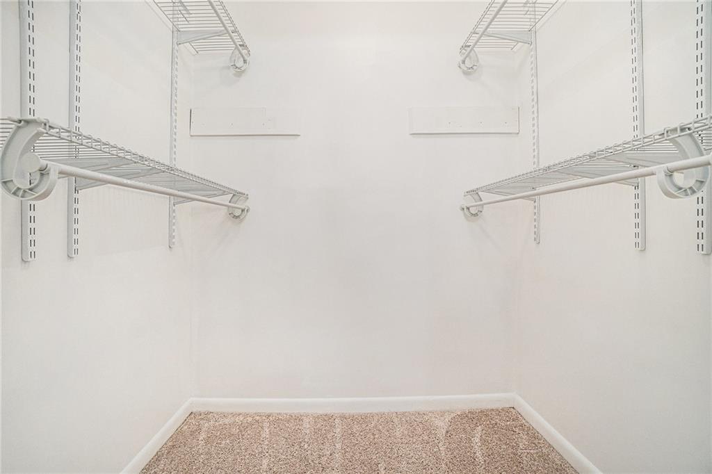 1150 Collier Road Northwest, Unit 12F Atlanta, GA 30318 - Photo 19 of 26 a view of small space with empty racks