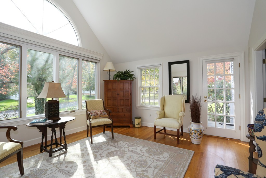 18 Winslow Road Wellesley, MA 02481 - Photo 4 of 19 a living room with furniture and floor to ceiling windows