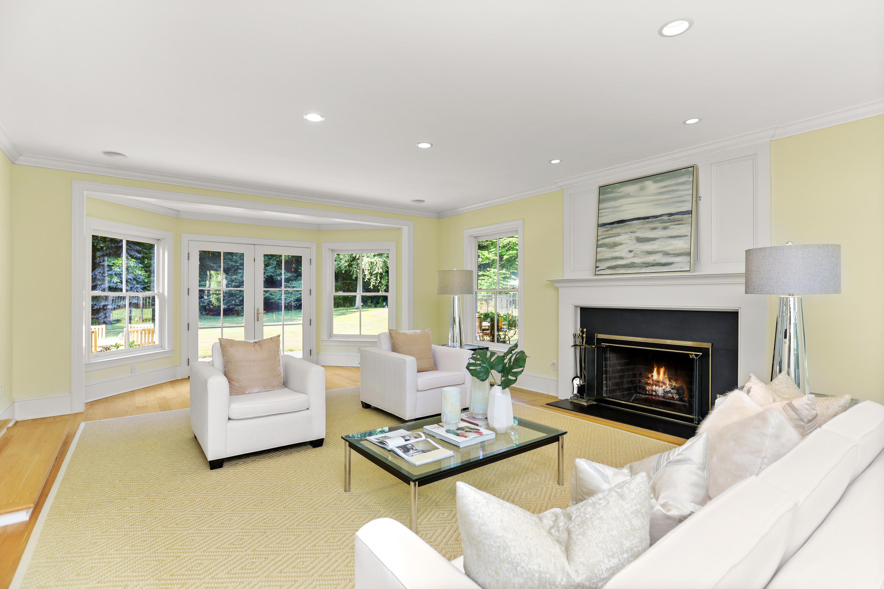 298 Brookside Road Darien, CT 06820 - Photo 12 of 36 a living room with furniture and a fireplace
