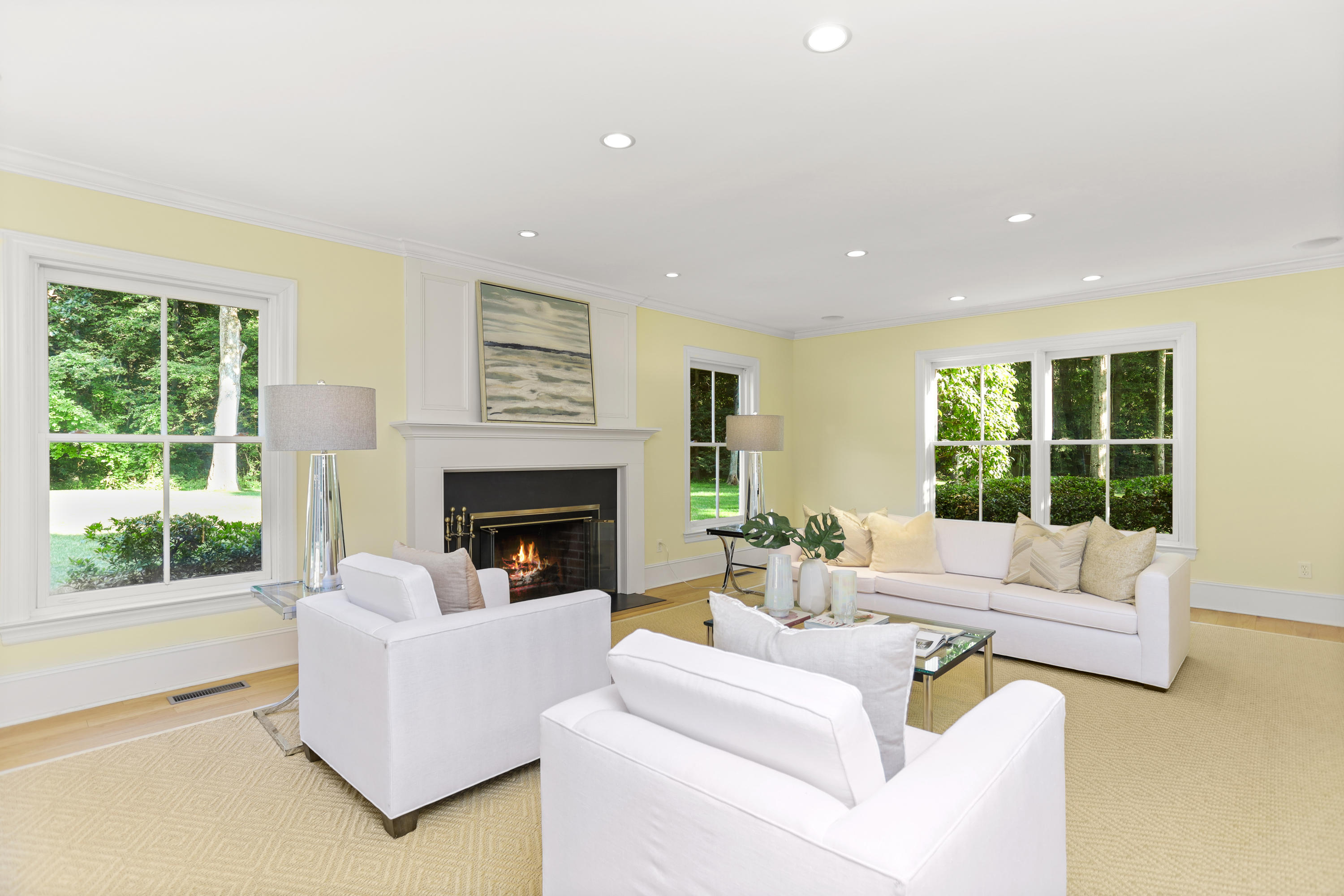 298 Brookside Road Darien, CT 06820 - Photo 13 of 36 a living room with furniture and a fireplace