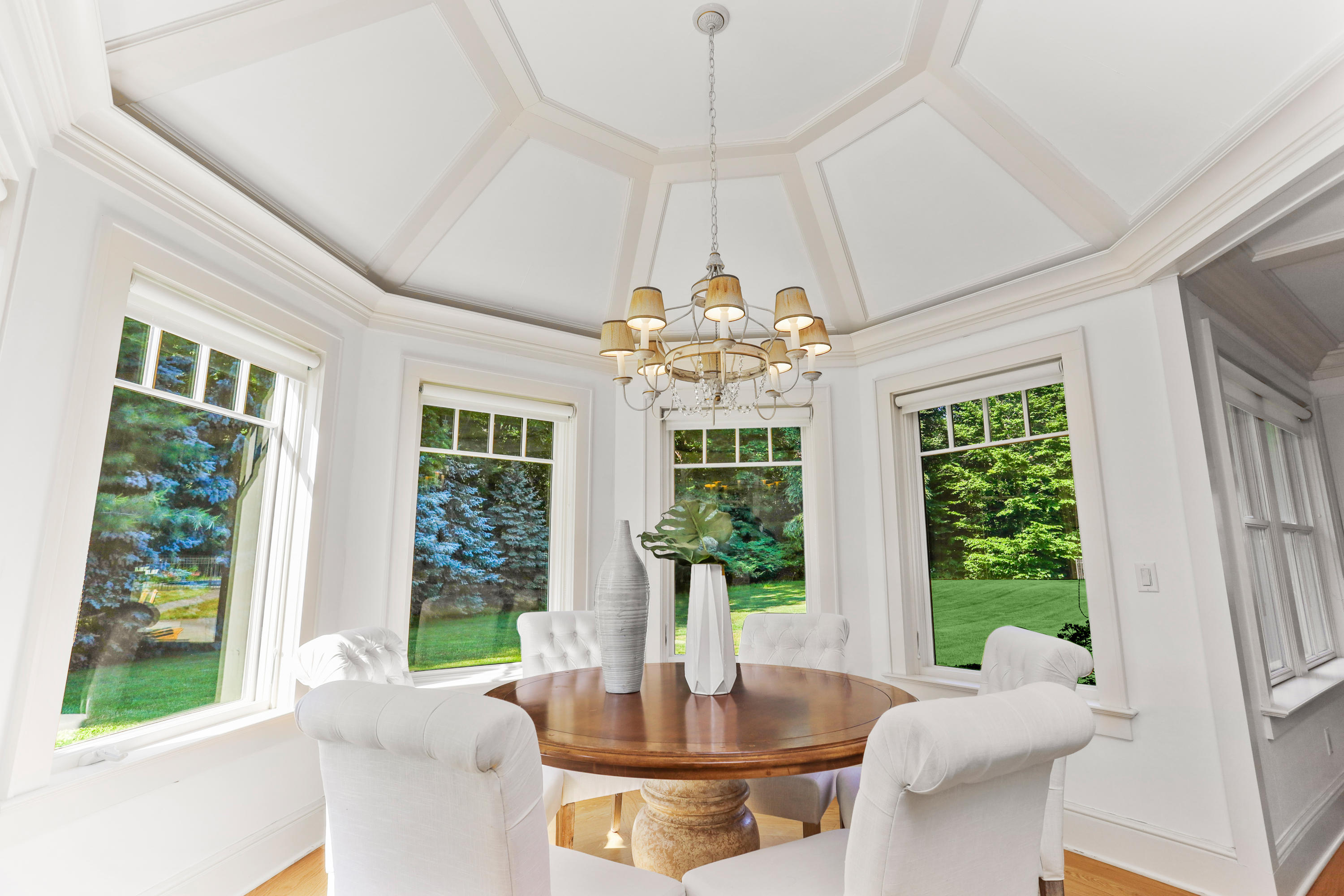 298 Brookside Road Darien, CT 06820 - Photo 4 of 36 a view of a dining room with furniture large windows and wooden floor