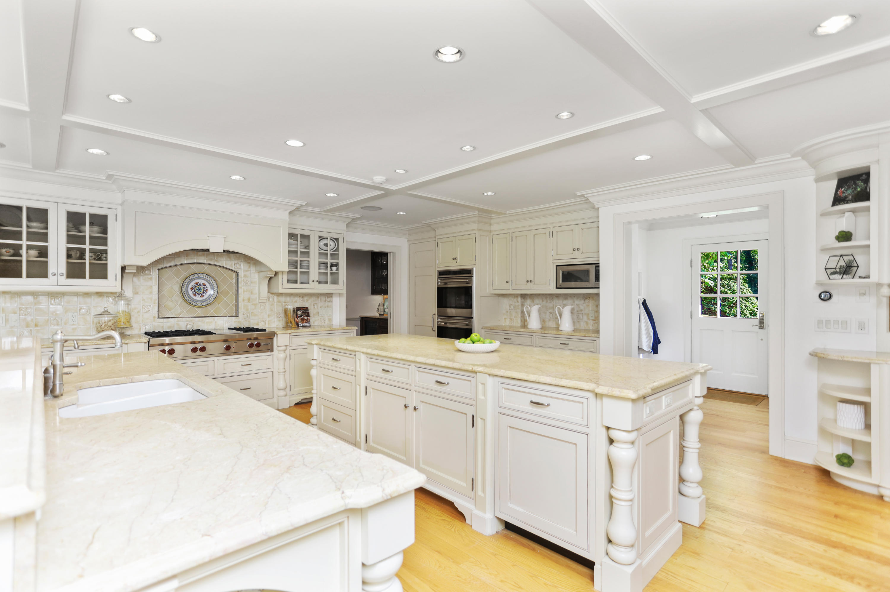 298 Brookside Road Darien, CT 06820 - Photo 5 of 36 a large white kitchen with cabinets