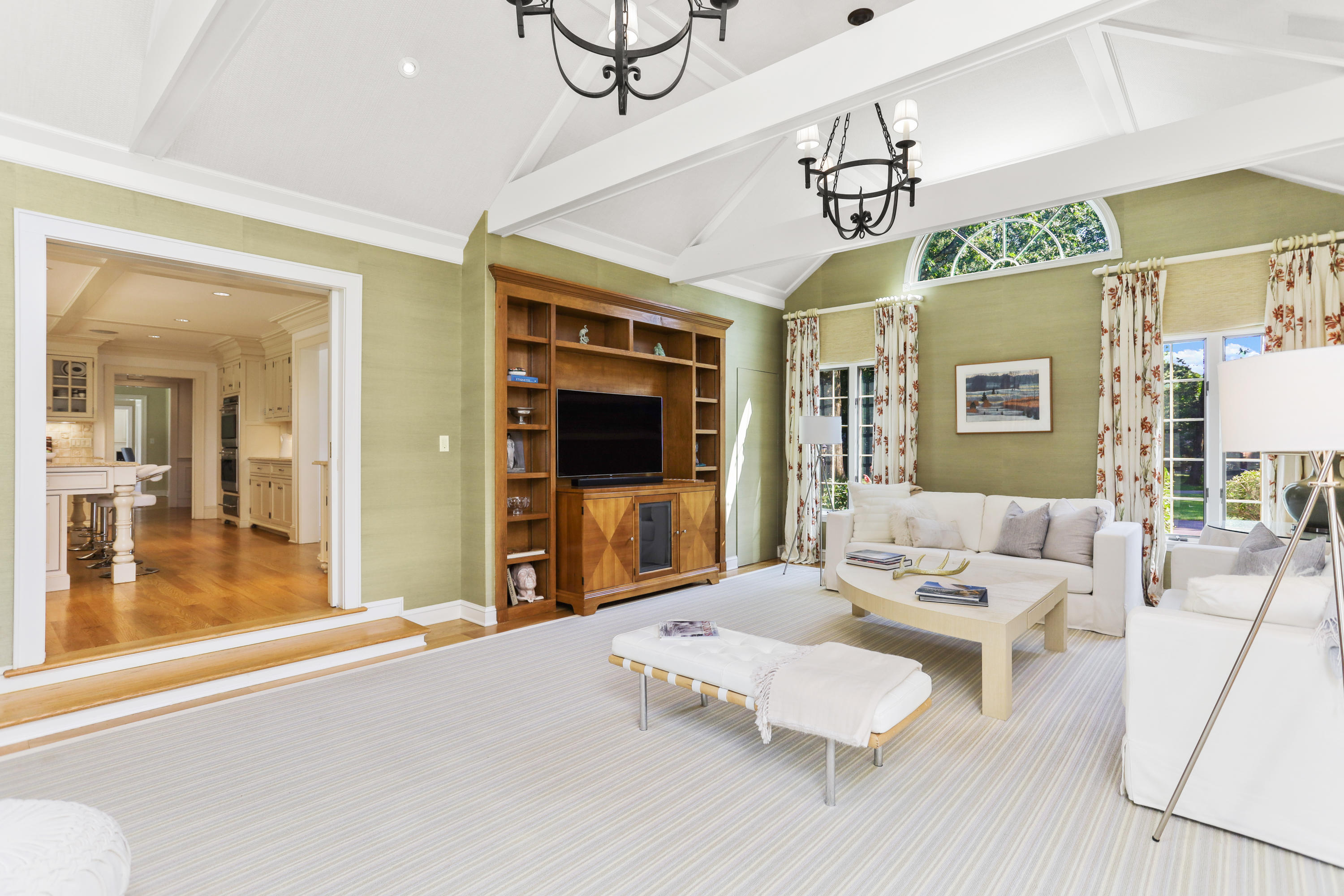 298 Brookside Road Darien, CT 06820 - Photo 7 of 36 a living room with furniture and a flat screen tv