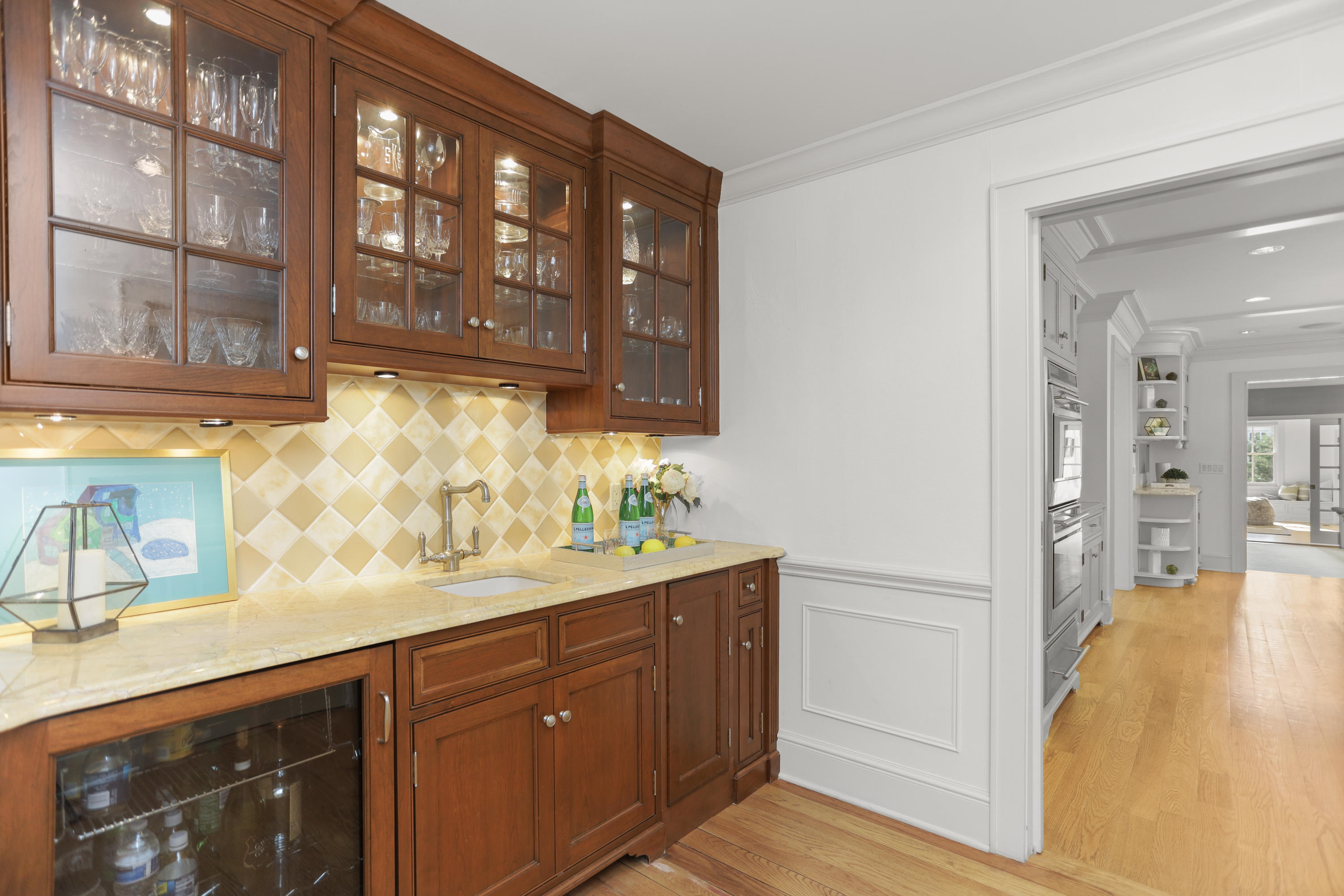 298 Brookside Road Darien, CT 06820 - Photo 9 of 36 a kitchen with a sink and cabinets