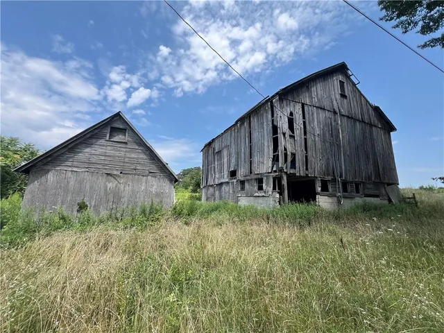 a house view with backyard space and garden