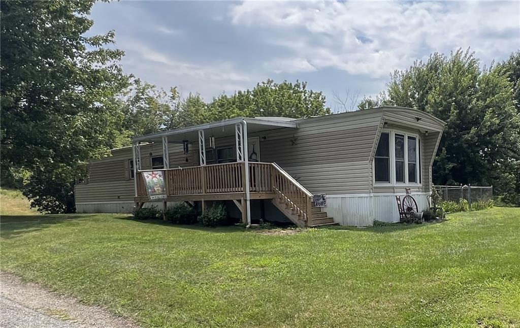659 Alexander Road Latrobe, PA 15650 - Photo 12 of 15 a view of a house with a yard and sitting area