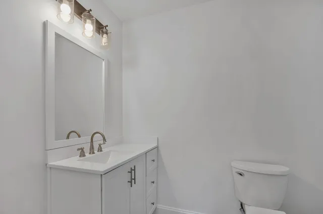 a bathroom with a bathtub and toilet