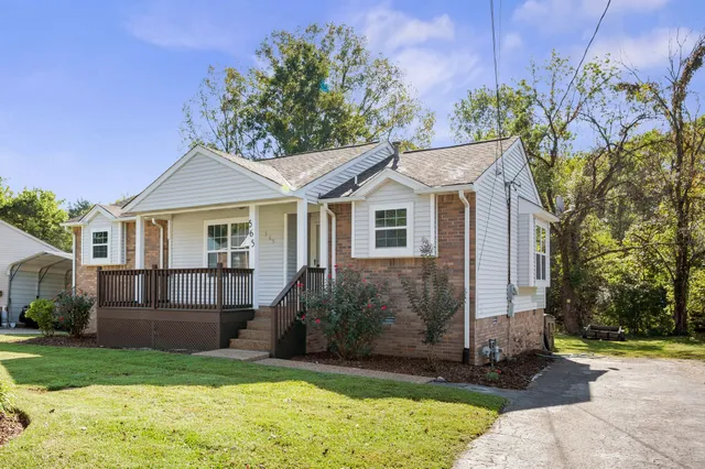 a view of a yard in front of house