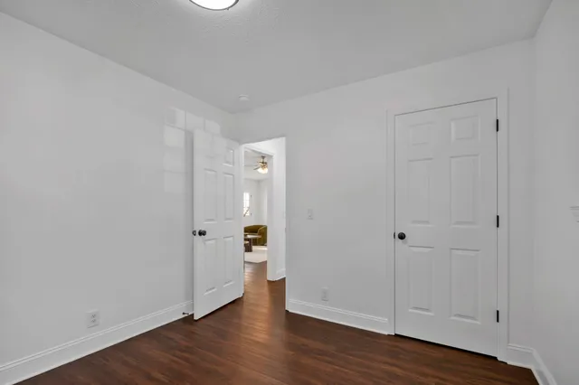 a view of backyard with a deck