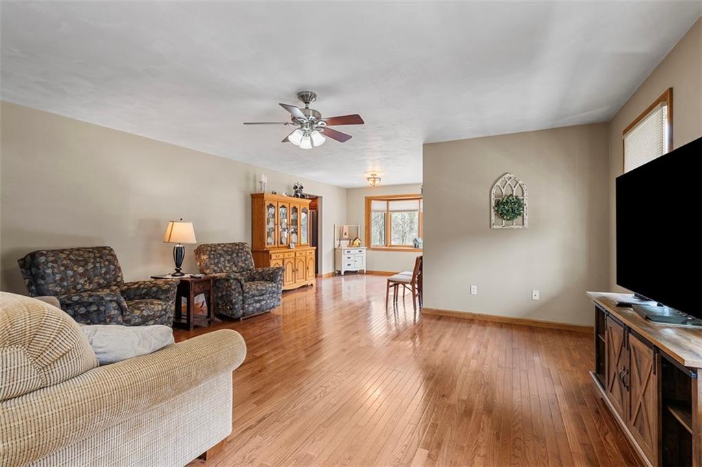 172 Valley Fields Drive Pittsburgh, PA 15239 - Photo 12 of 41 a living room with furniture and a flat screen tv