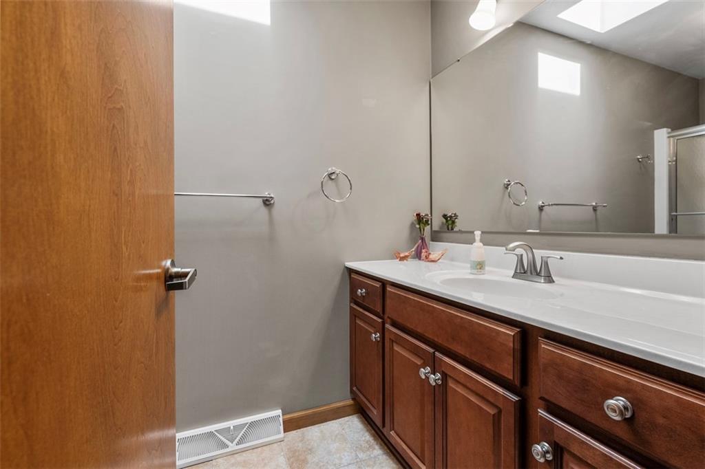 172 Valley Fields Drive Pittsburgh, PA 15239 - Photo 27 of 41 a bathroom with a sink and a mirror