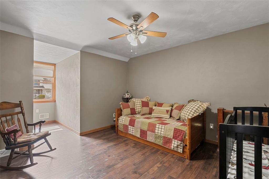 172 Valley Fields Drive Pittsburgh, PA 15239 - Photo 28 of 41 a bed room with bed and a chair