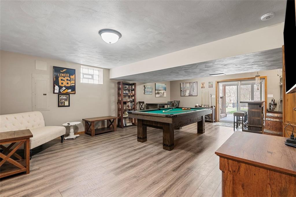 172 Valley Fields Drive Pittsburgh, PA 15239 - Photo 30 of 41 a living room with furniture and a wooden floor