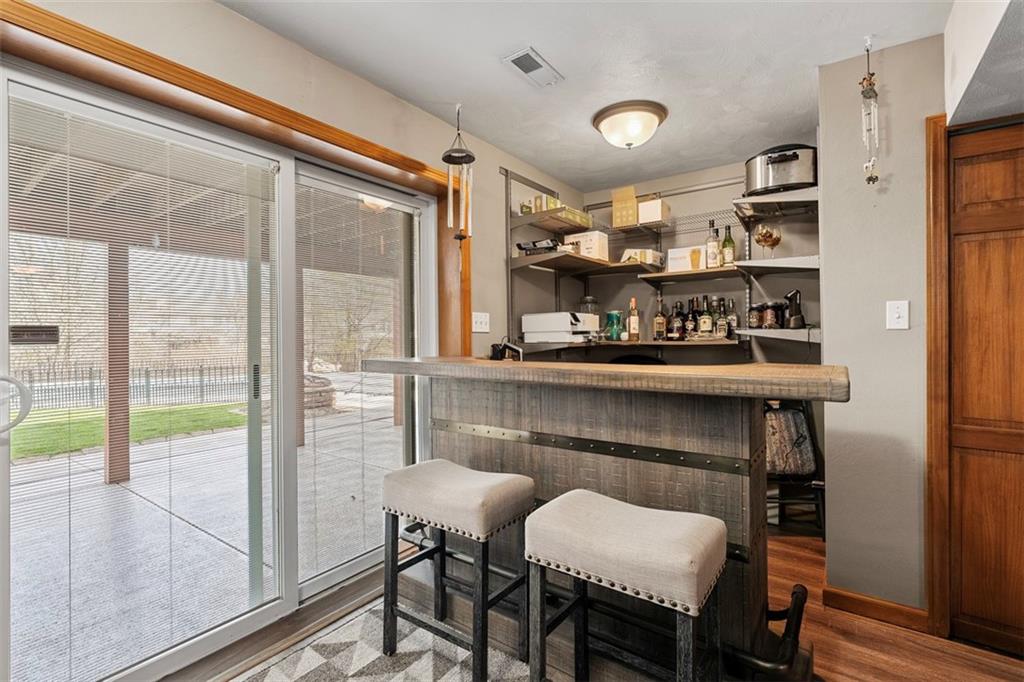 172 Valley Fields Drive Pittsburgh, PA 15239 - Photo 32 of 41 a kitchen with a table and chairs