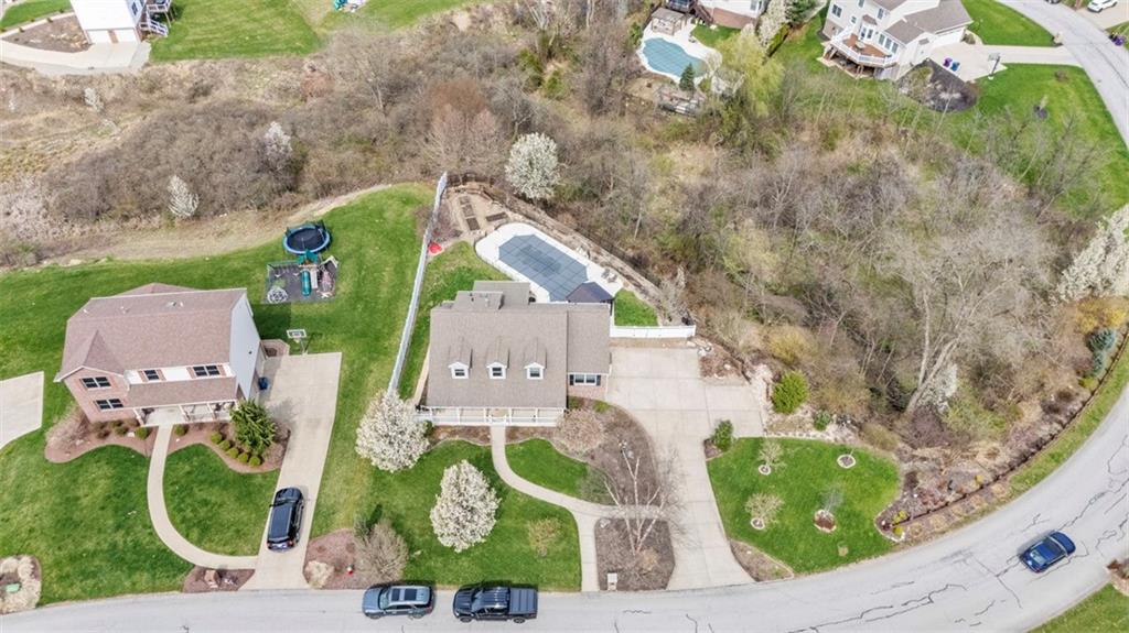 172 Valley Fields Drive Pittsburgh, PA 15239 - Photo 40 of 41 an aerial view of a house with a swimming pool