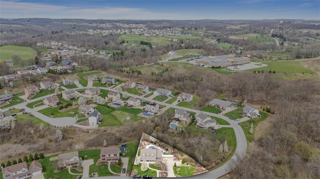 172 Valley Fields Drive Pittsburgh, PA 15239 - Photo 41 of 41 an aerial view of a house with a yard and mountain