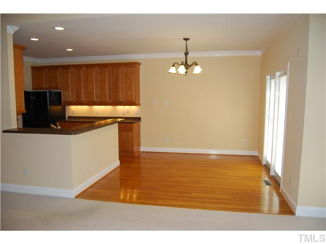 107 Nouveau Avenue Raleigh, NC 27615 - Photo 22 of 25 Awesome open floorplan from the kitchen to the breakfast room and family room! The interior of the home has fresh paint throughout!