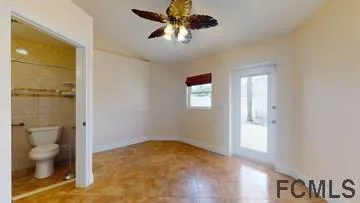 a view of a bathroom with a toilet