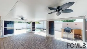 an aerial view of a house with outdoor space