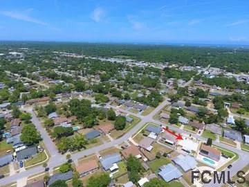 an aerial view of a city with lots of residential buildings