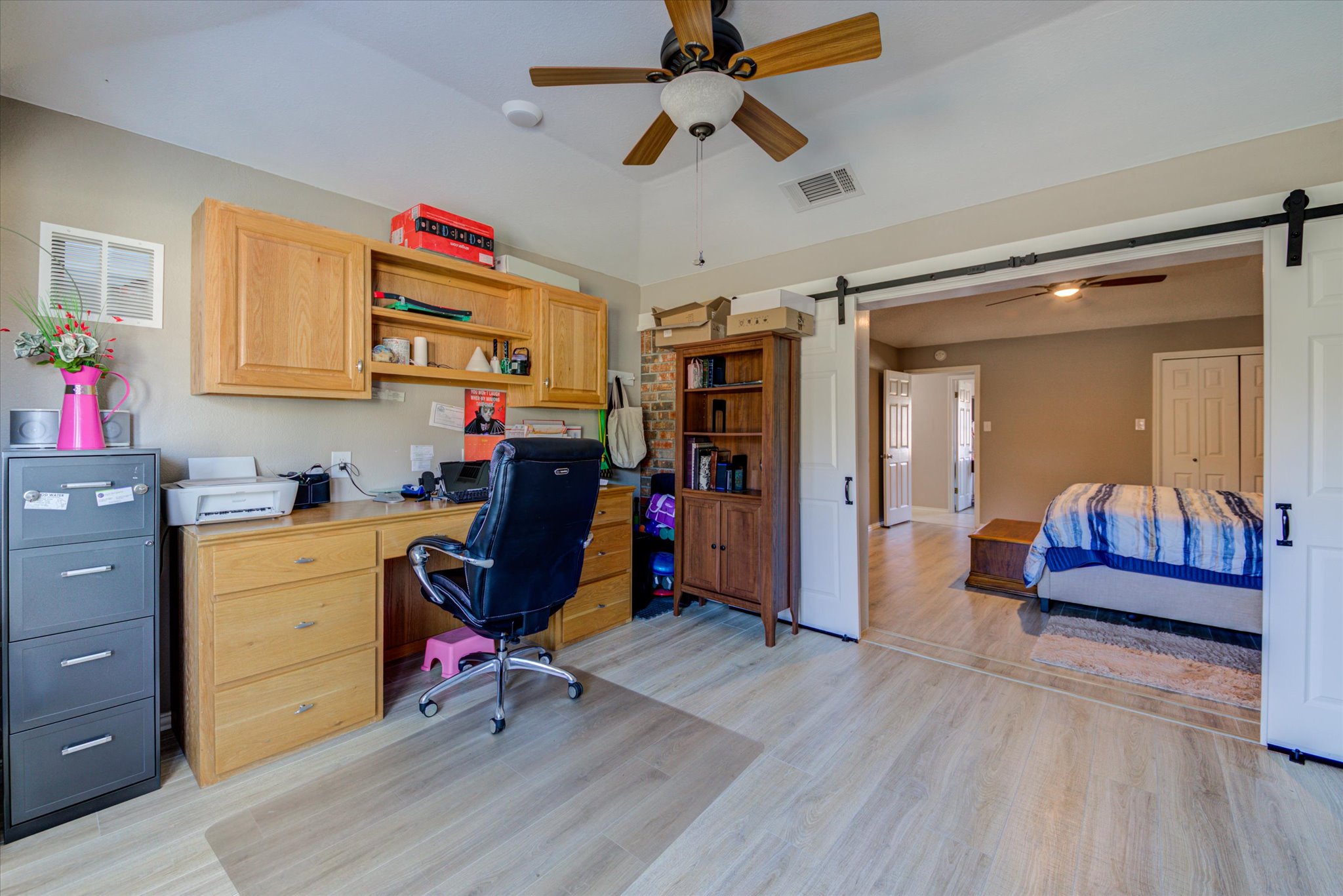 200 Harbor Circle Georgetown, TX 78633 - Photo 13 of 38 a view of a workspace with furniture and a window