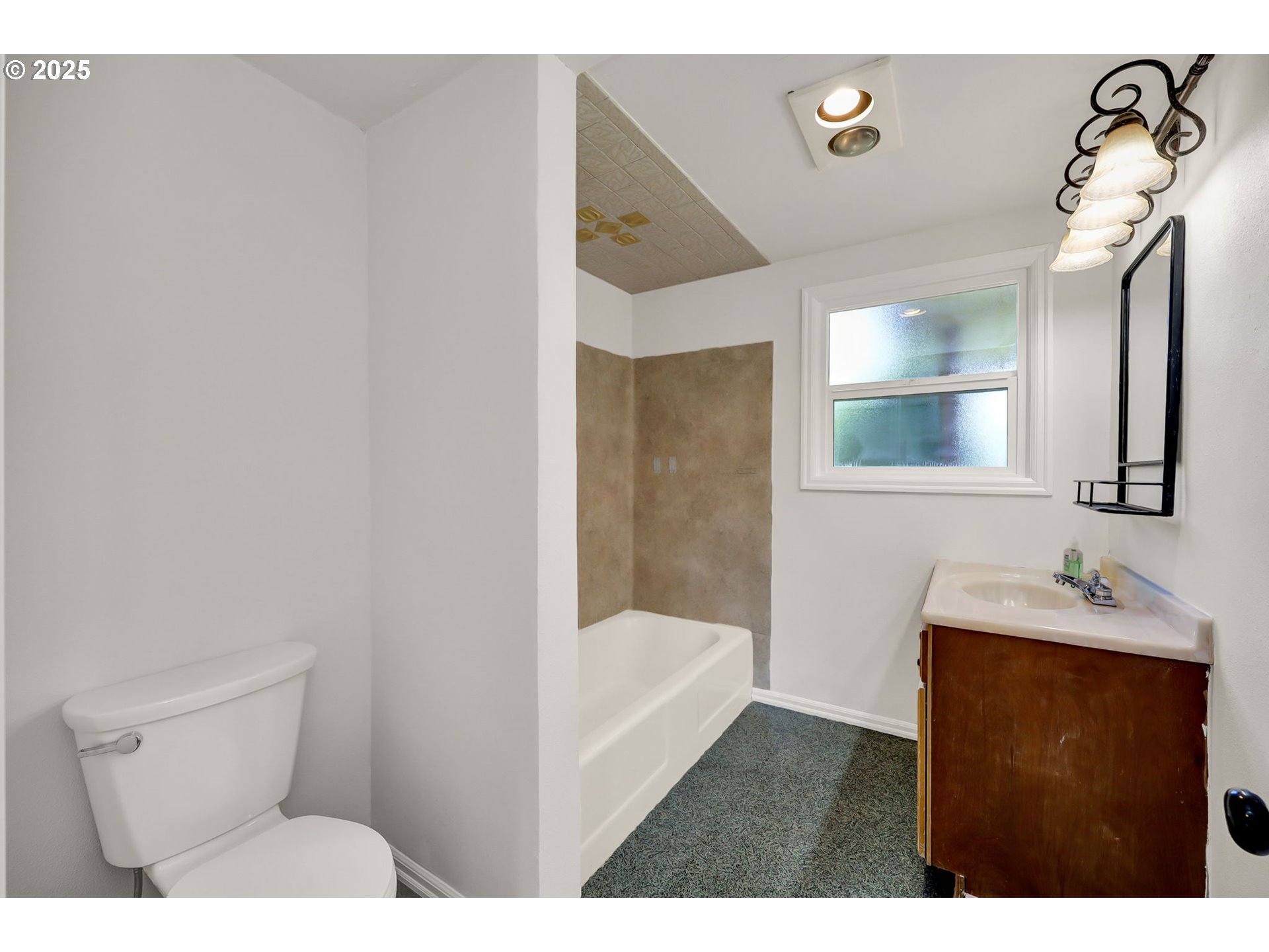 1119 7th Street Springfield, OR 97477 - Photo 23 of 43 a bathroom with a sink and a mirror