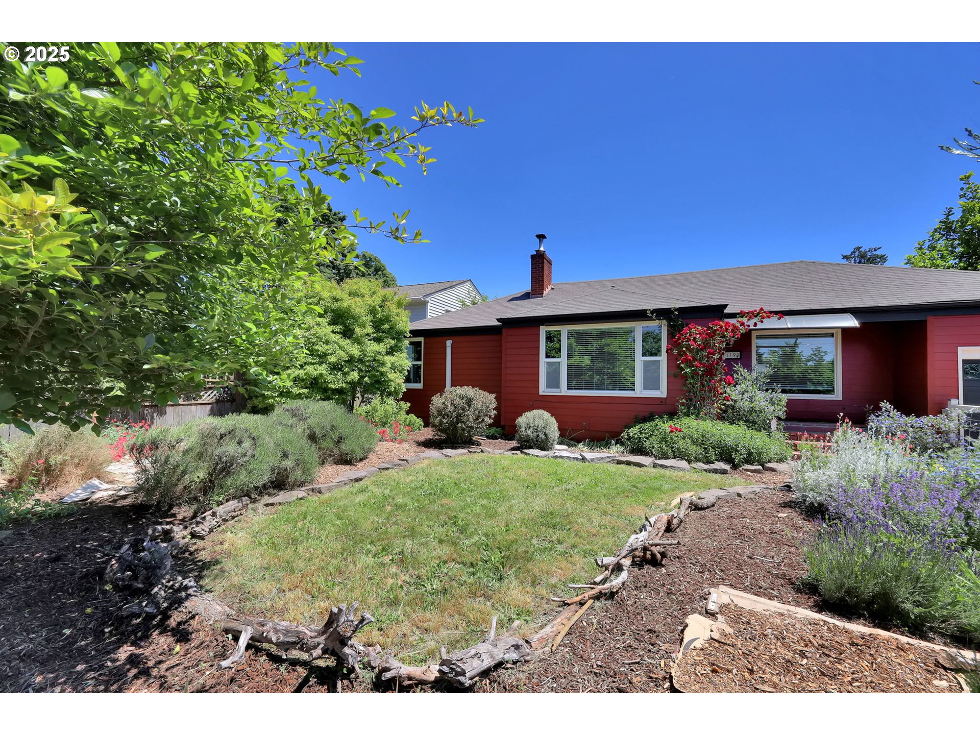 1119 7th Street Springfield, OR 97477 - Photo 40 of 43 a front view of a house with garden