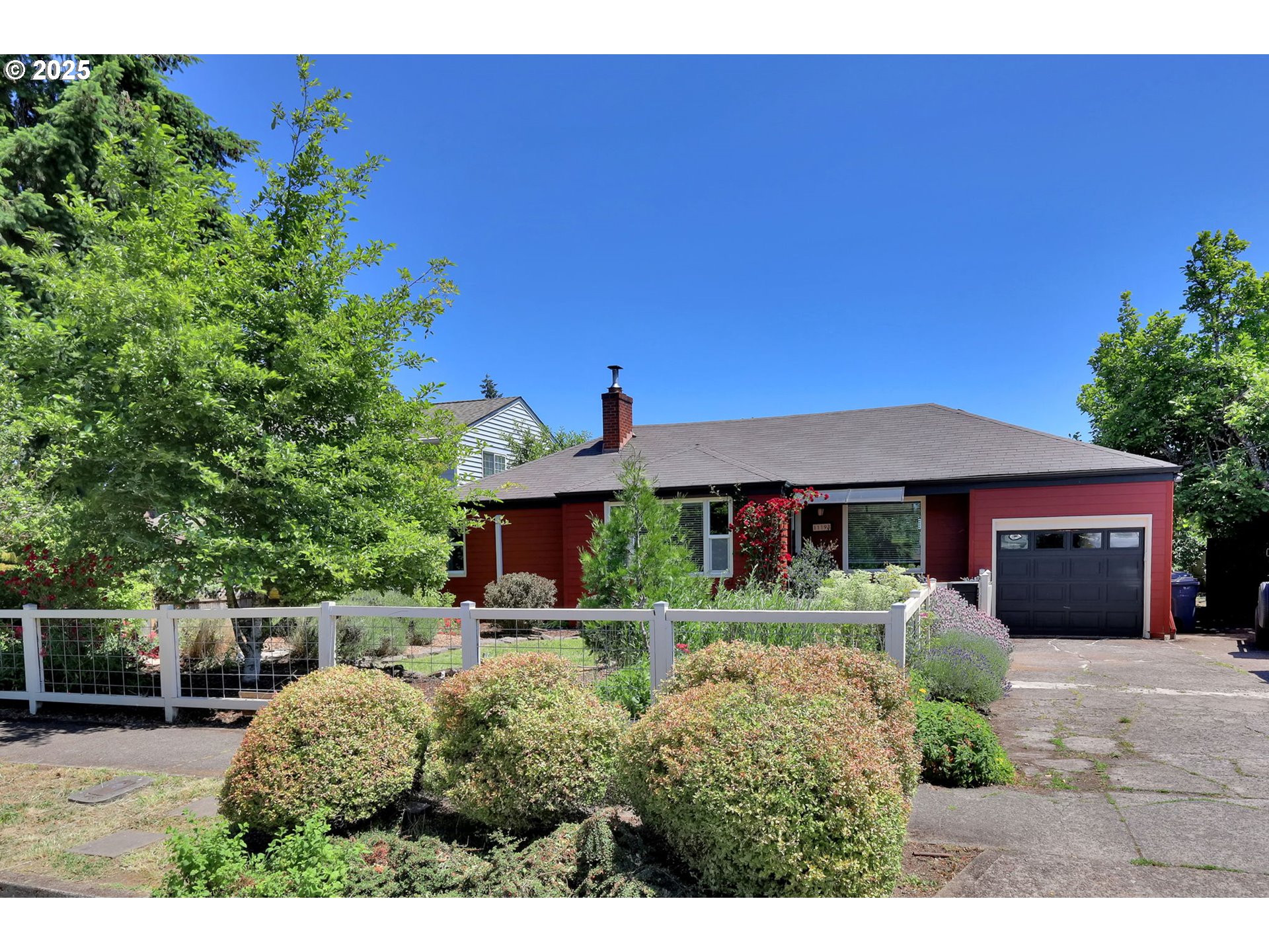 1119 7th Street Springfield, OR 97477 - Photo 41 of 43 a front view of a house with garden