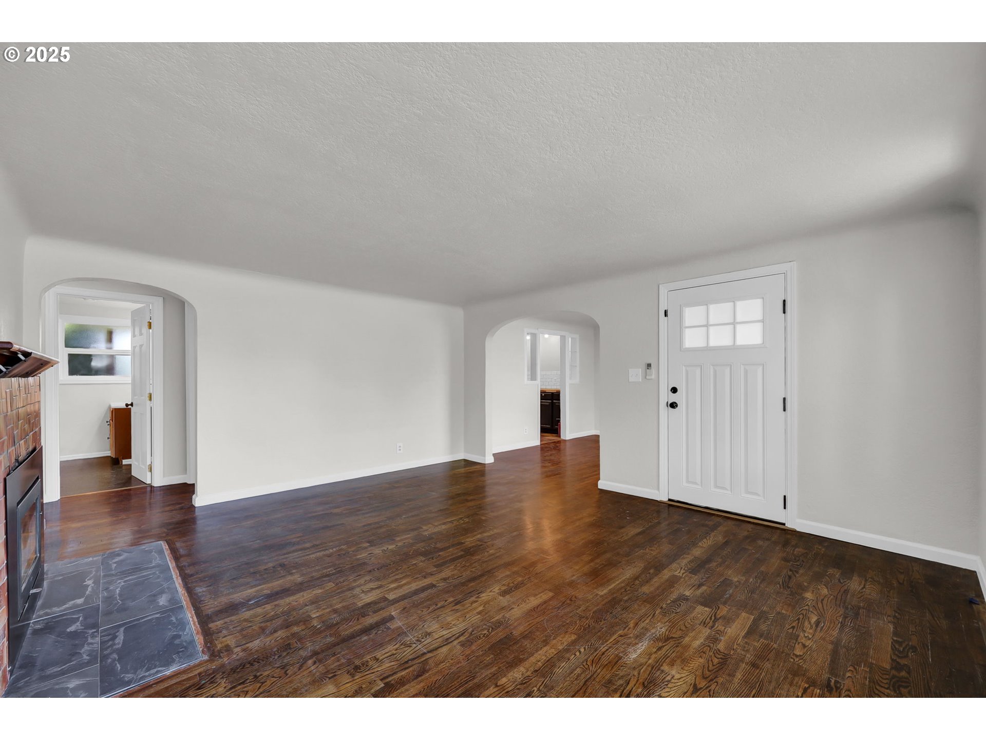 1119 7th Street Springfield, OR 97477 - Photo 9 of 43 a view of empty room with wooden floor