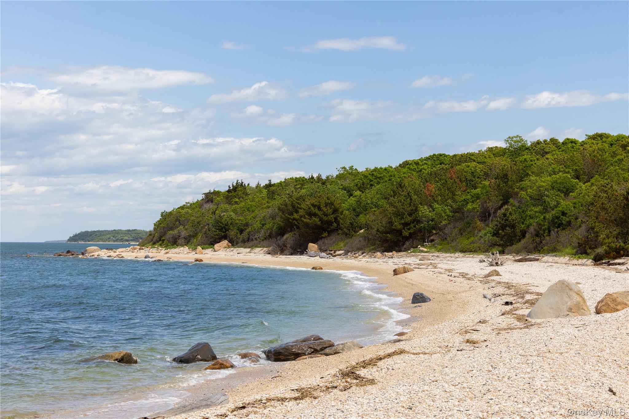2840 Stars Road East Marion, NY 11939 - Photo 25 of 43 a view of ocean beach and mountain