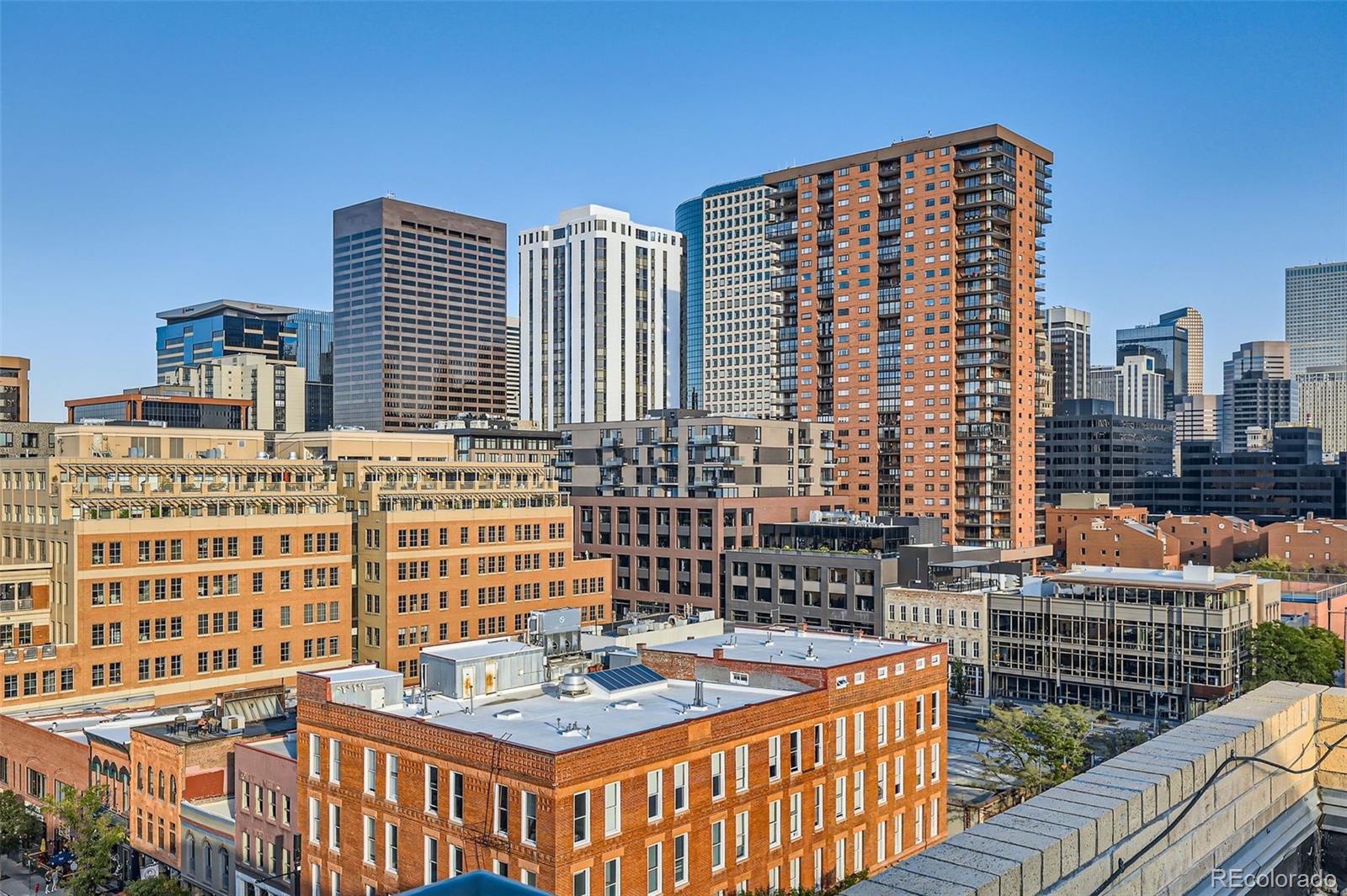 1499 Blake Street, Unit 5I Denver, CO 80202 - Photo 27 of 28 a front view of a building with glass windows