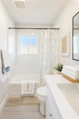 a view of a room with wooden walls