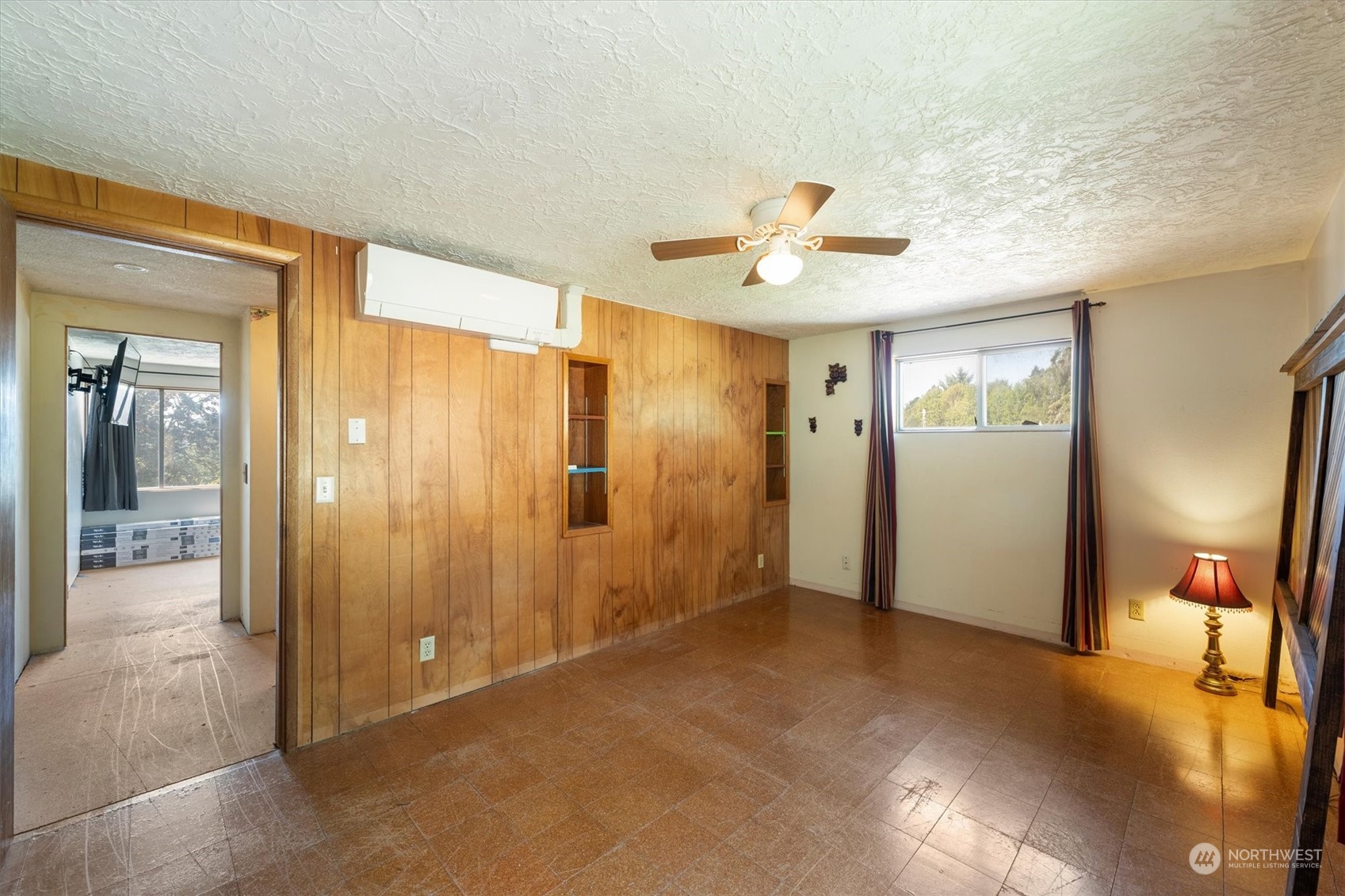 3827 Sunset Way Longview, WA 98632 - Photo 34 of 40 a view of a livingroom with a hall and a chandelier