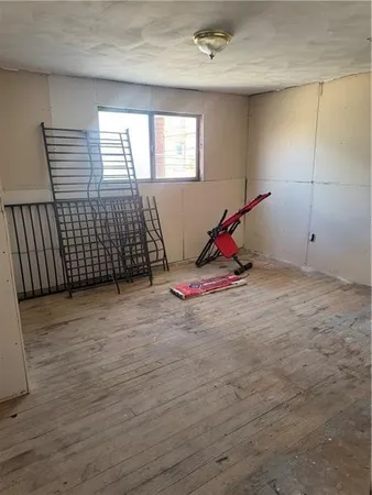 a room with air conditioner and windows