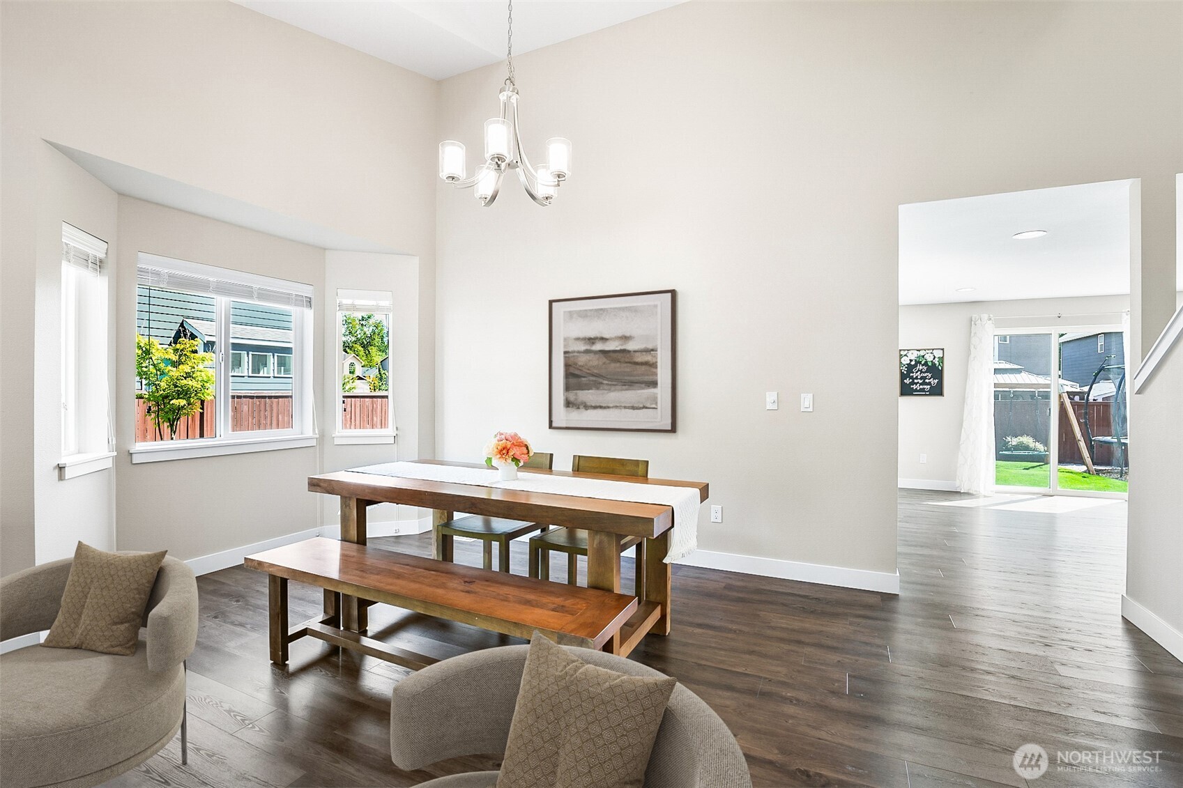 708 Rosario Place Northeast Renton, WA 98059 - Photo 6 of 38 a living room with furniture a window and wooden floor