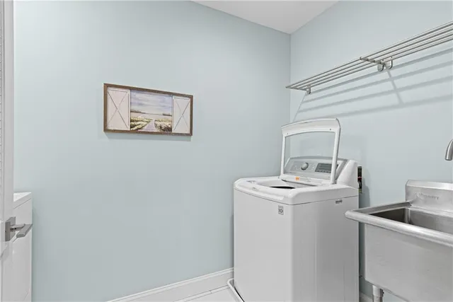 a house with palm trees in front of it