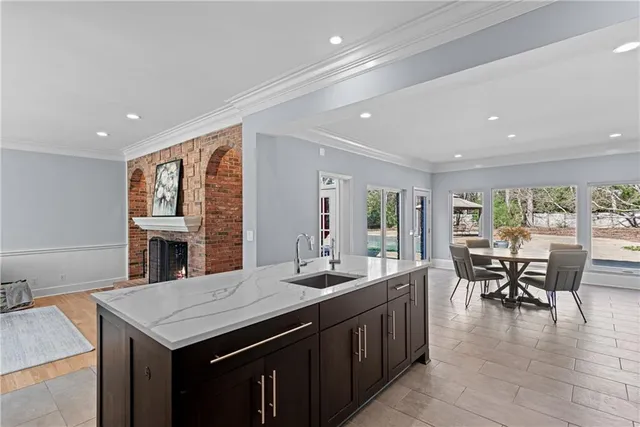 a kitchen with a stove and cabinets