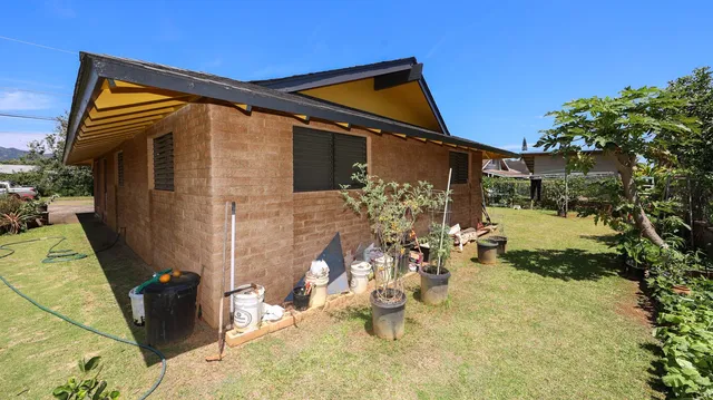 a backyard of a house with lots of green space