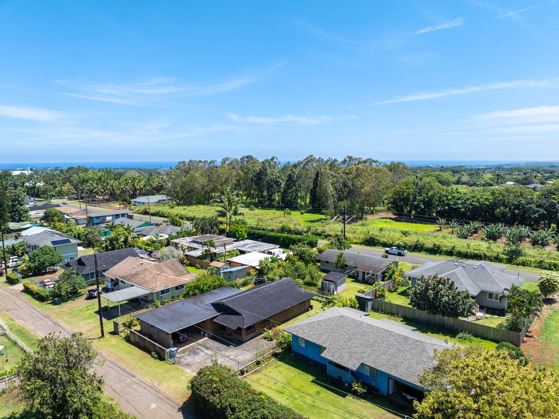 6033 Puka Street Kapaa, HI 96746 - Photo 19 of 23 an aerial view of a houses with a swimming pool