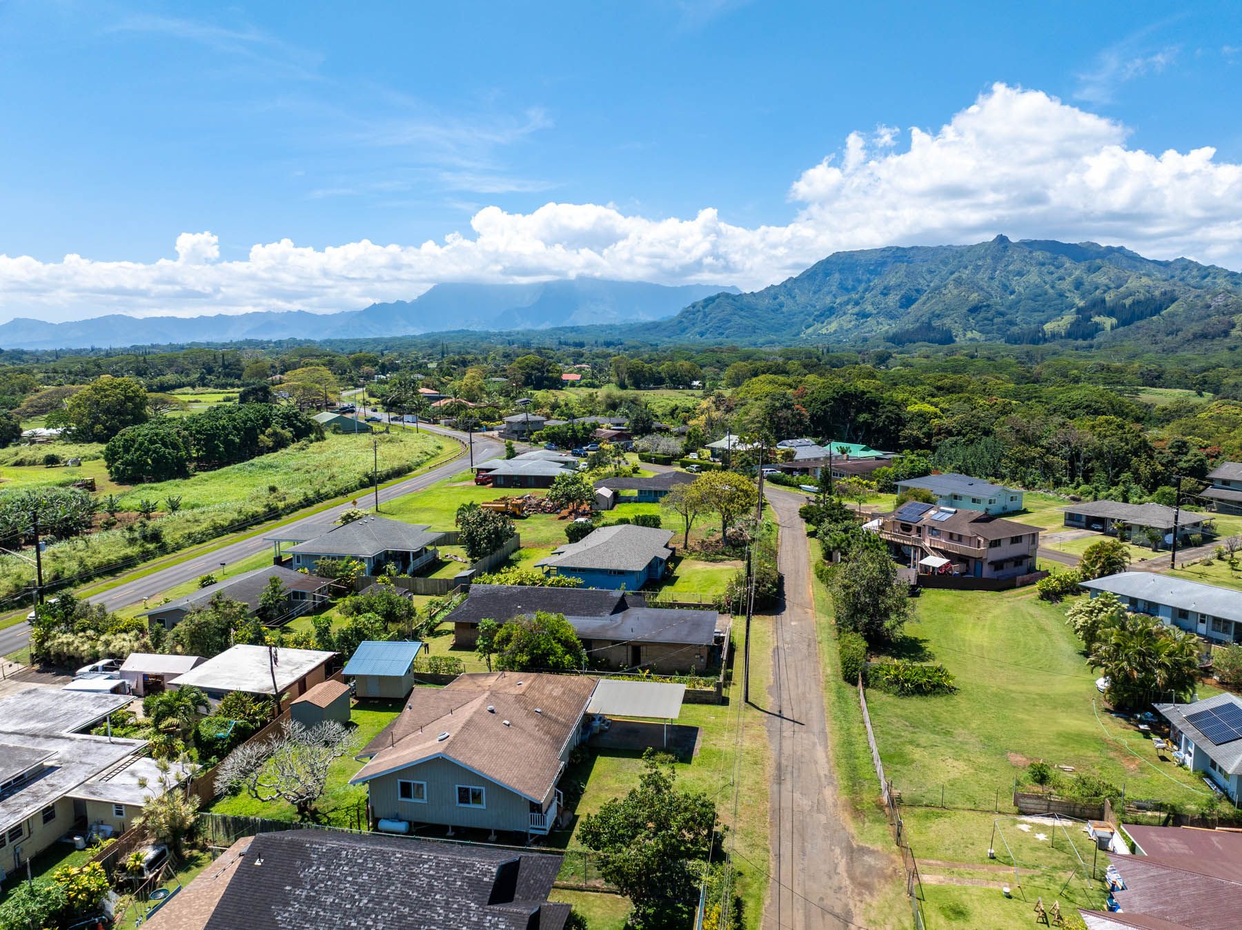 6033 Puka Street Kapaa, HI 96746 - Photo 22 of 23 a view of a city with mountains in the background