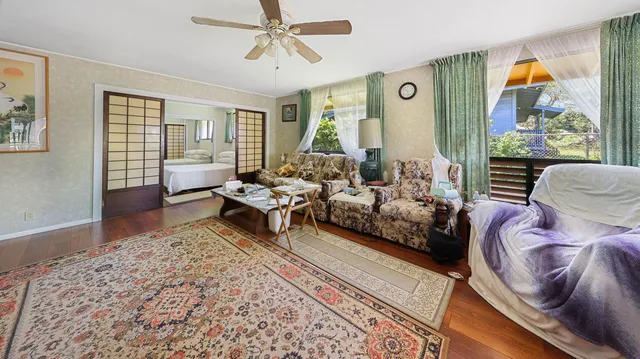a living room with furniture and a window
