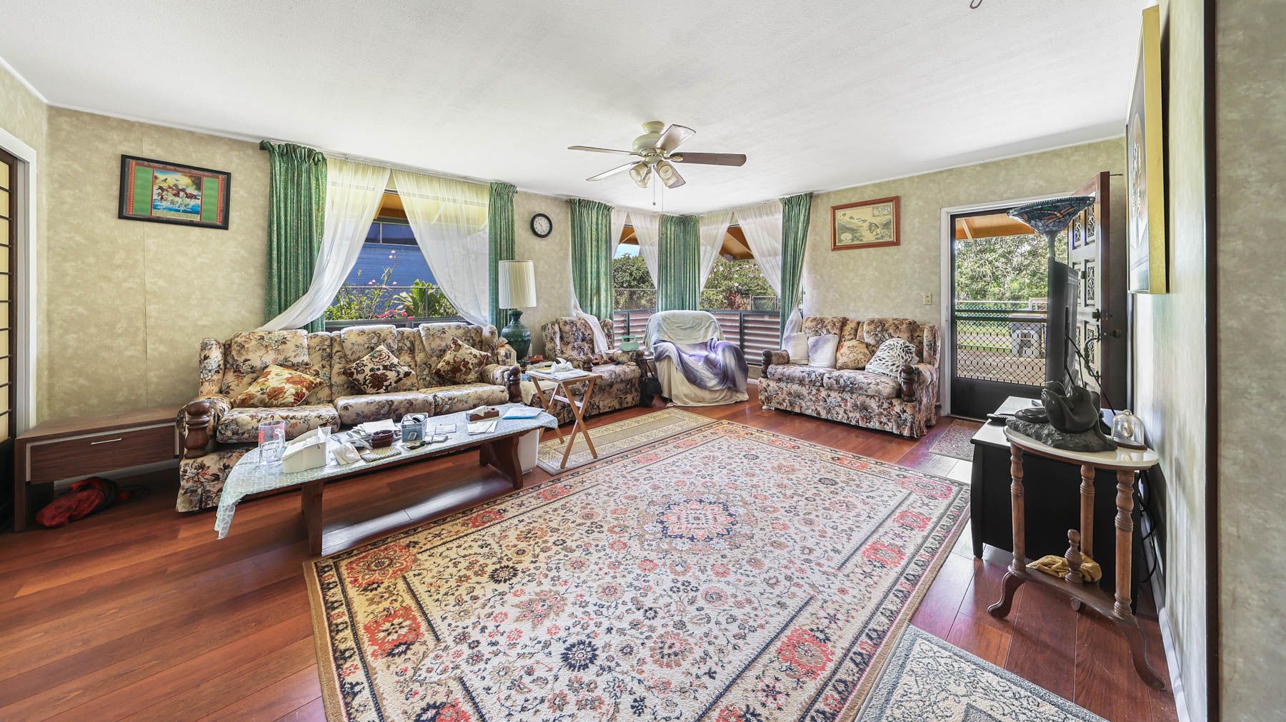 6033 Puka Street Kapaa, HI 96746 - Photo 5 of 23 a living room with furniture and a table