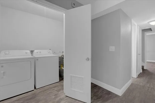 a utility room with dryer and washer