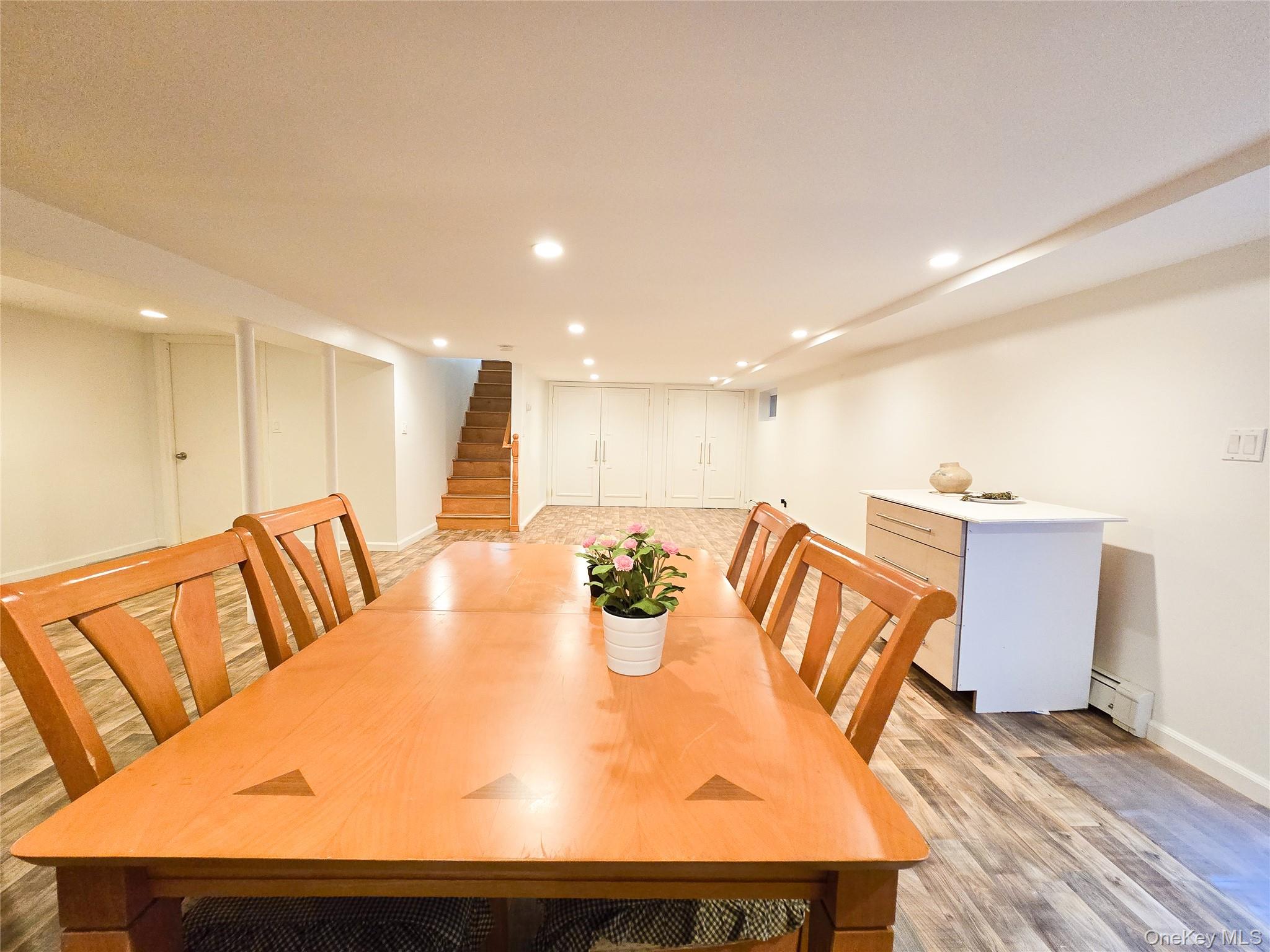 249 Cold Spring Road Syosset, NY 11791 - Photo 19 of 28 a view of kitchen with dining table and chairs