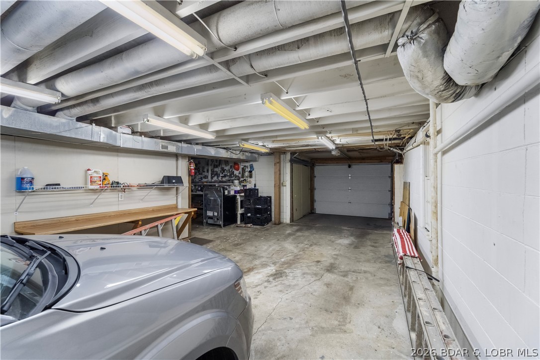 2264 Bittersweet Road Lake Ozark, MO 65049 - Photo 33 of 54 2 car deep garage with workshop