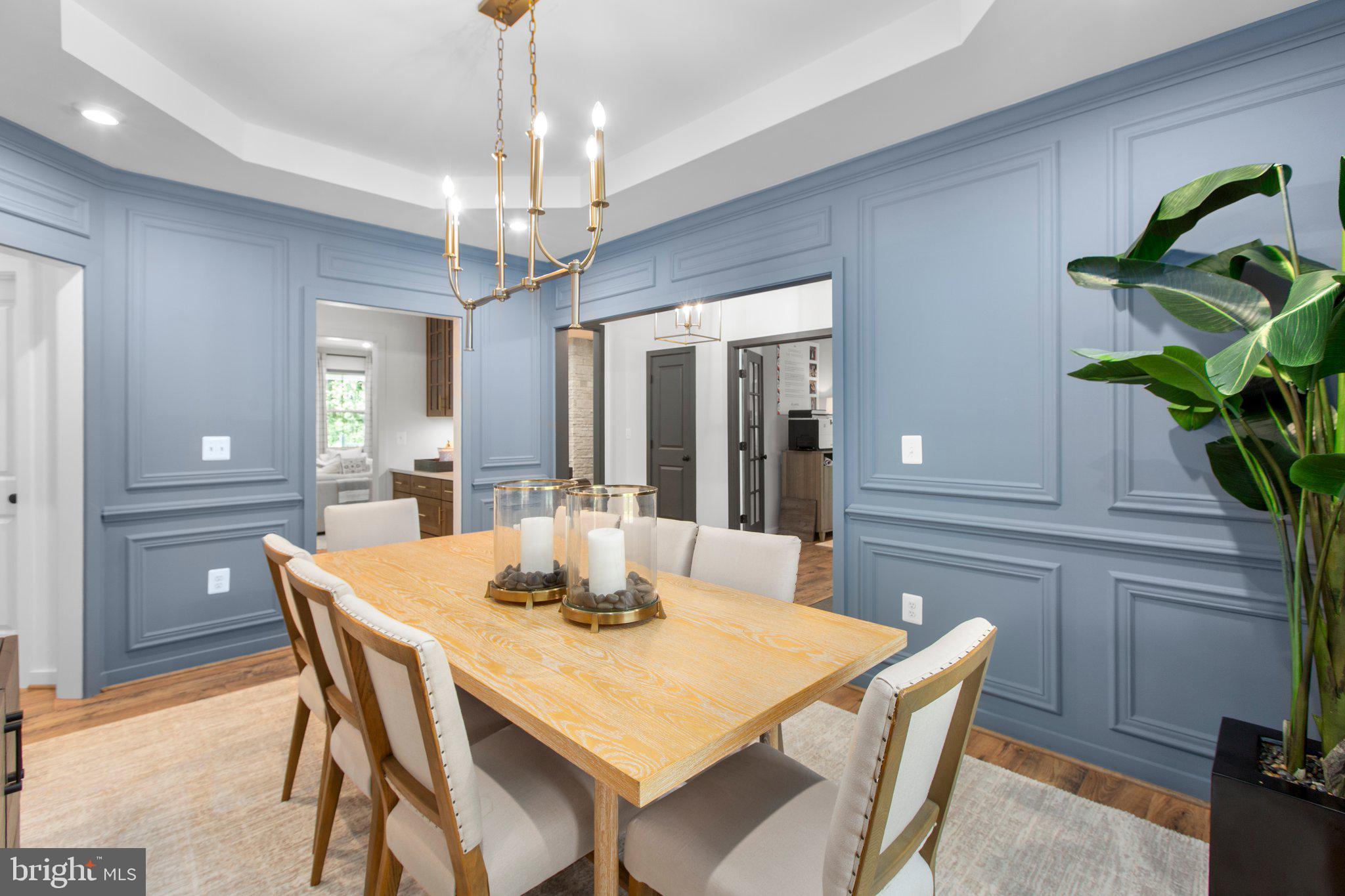 4 Zoar Road Locust Grove, VA 22508 - Photo 13 of 32 a dining room with furniture a chandelier and wooden floor