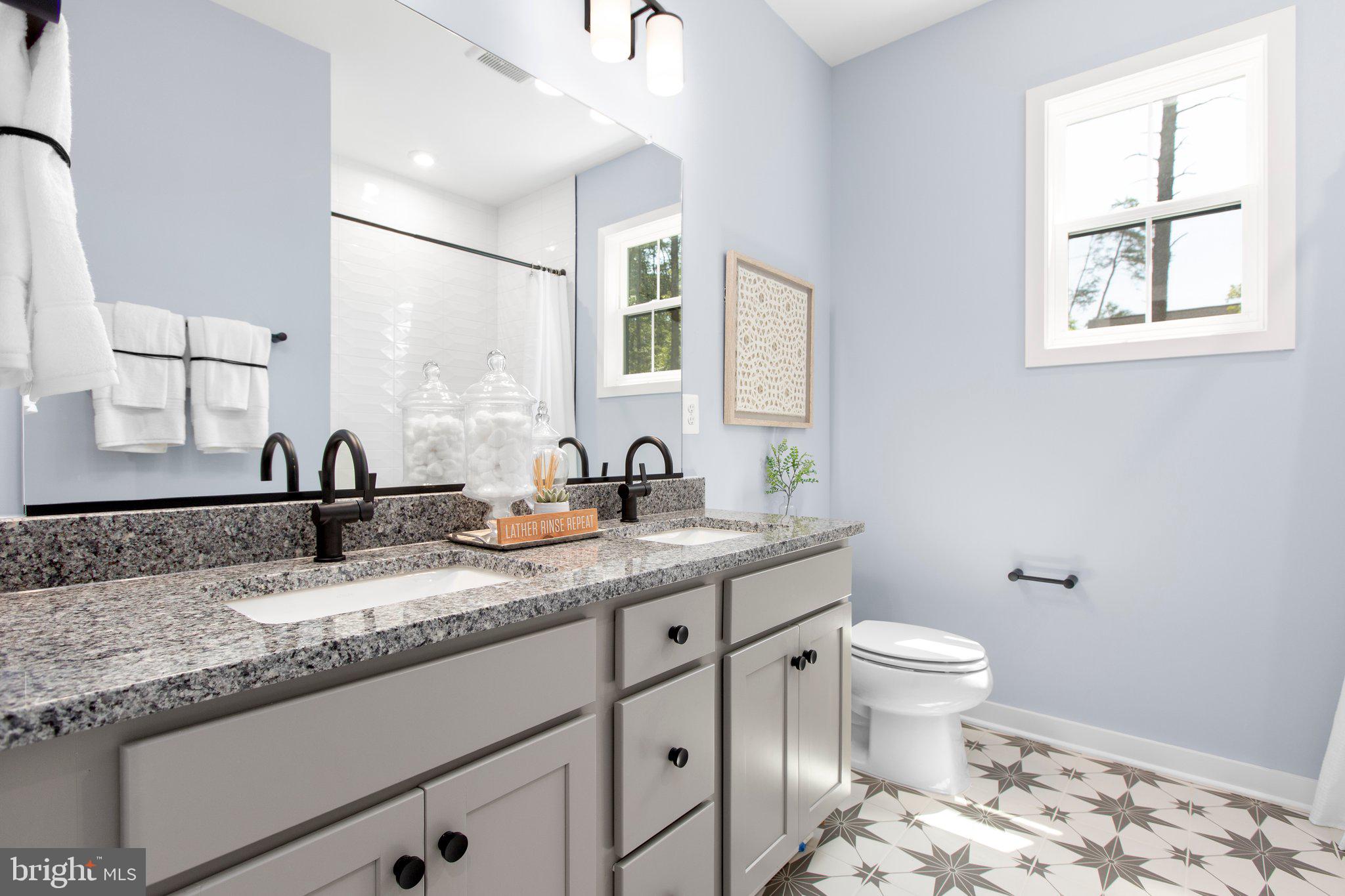 4 Zoar Road Locust Grove, VA 22508 - Photo 28 of 32 a bathroom with a granite countertop sink and a toilet