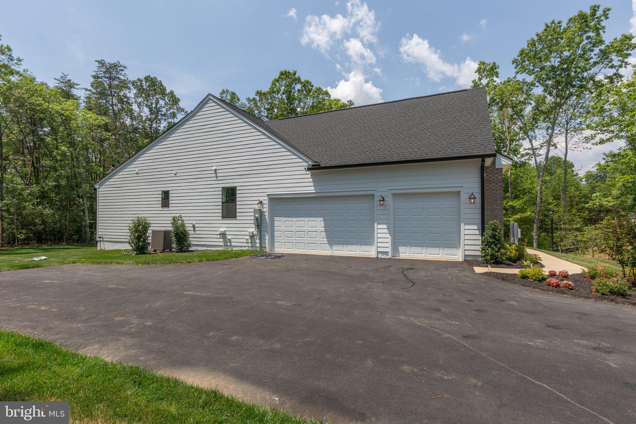 4 Zoar Road Locust Grove, VA 22508 - Photo 29 of 32 a view of a house with a yard and garage
