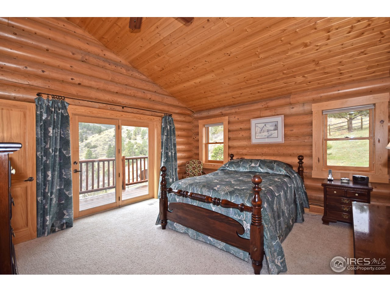 15435 Lazuli Road Loveland, CO 80538 - Photo 8 of 25 Main floor master bedroom
