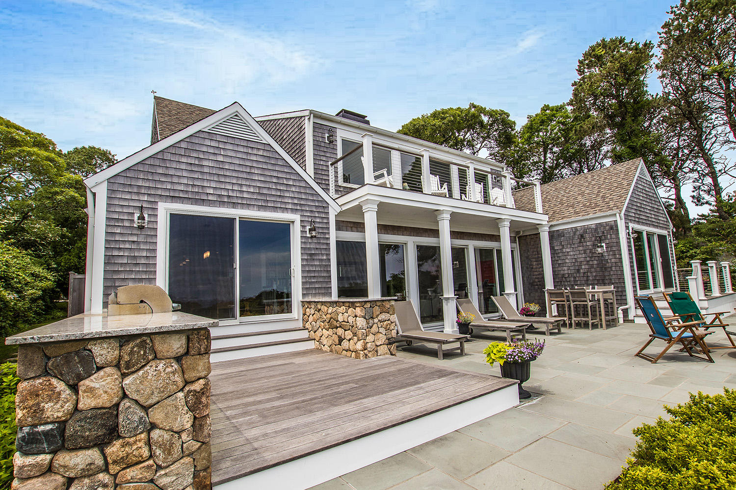 107 Captains Walk Chatham, MA 02650 - Photo 19 of 51 a view of a house with sitting area and garden